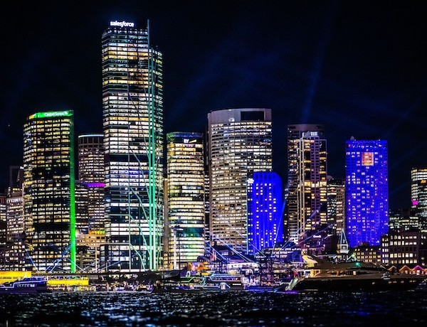 Light My Building example of buildings reflecting on Sydney Harbour